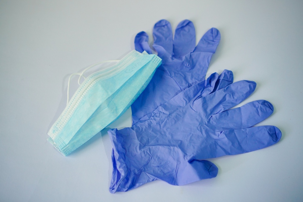 A FRSM face mask and protective gloves