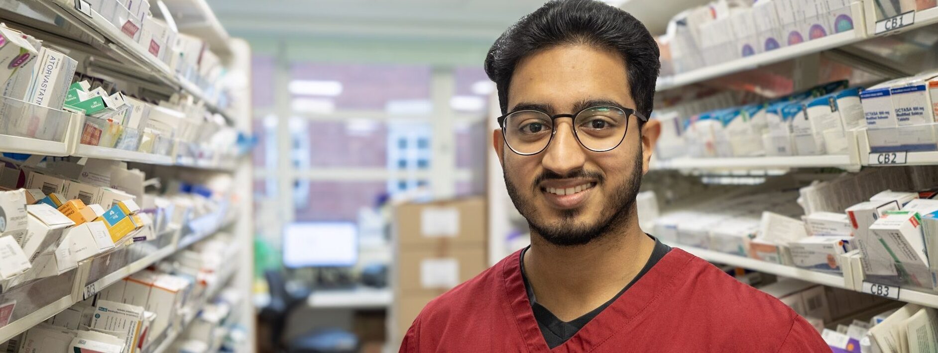 Photo in Pharmacy of smiling Trainee Pharmacist
