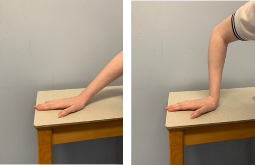 An image of a hand with straight fingers and thumb slightly extended being pressed into a table top. The forearm is straight with wrist at a 45 degree angle. A second image shows the hand in the same position but the wrist is bent at a 90 degree angle