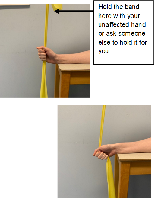 An image of a hand holding a resistance band off the edge of a table. The forearm is resting on the table. The resistance band is being held straight up by the other hand or a helper. An arrow indicates where the other hand should hold the band. A second image shows the hand is pulling the resistance band down, 