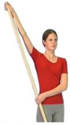 Person is standing holding broomstick with on had over end and stick is being used to push operated arm up