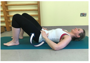 An individual lay flat on back and knees bent, feet are flat on floor or surface. Both knees bent and twisted over to one side using your hip.