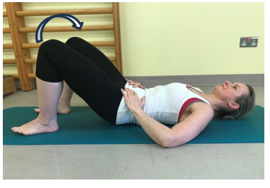 An individual lay flat on back and knees bent, feet are flat on floor or surface. Both knees moved to the side, keep the hips still and stomach muscles drawn in.