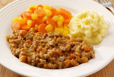 A photograph of a plate of food where the food is plated separately.