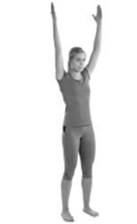 A picture of a person raising their arms upwards to the ceiling whilst feet are flat on the floor